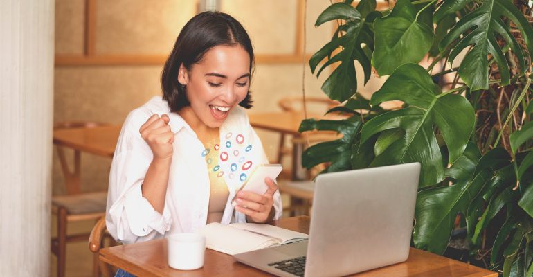 Asian woman interactions on mobile phone, concept with notification icons of like, message, email, comment and star above smartphone screen, person hands holding device, internet digital marketing.